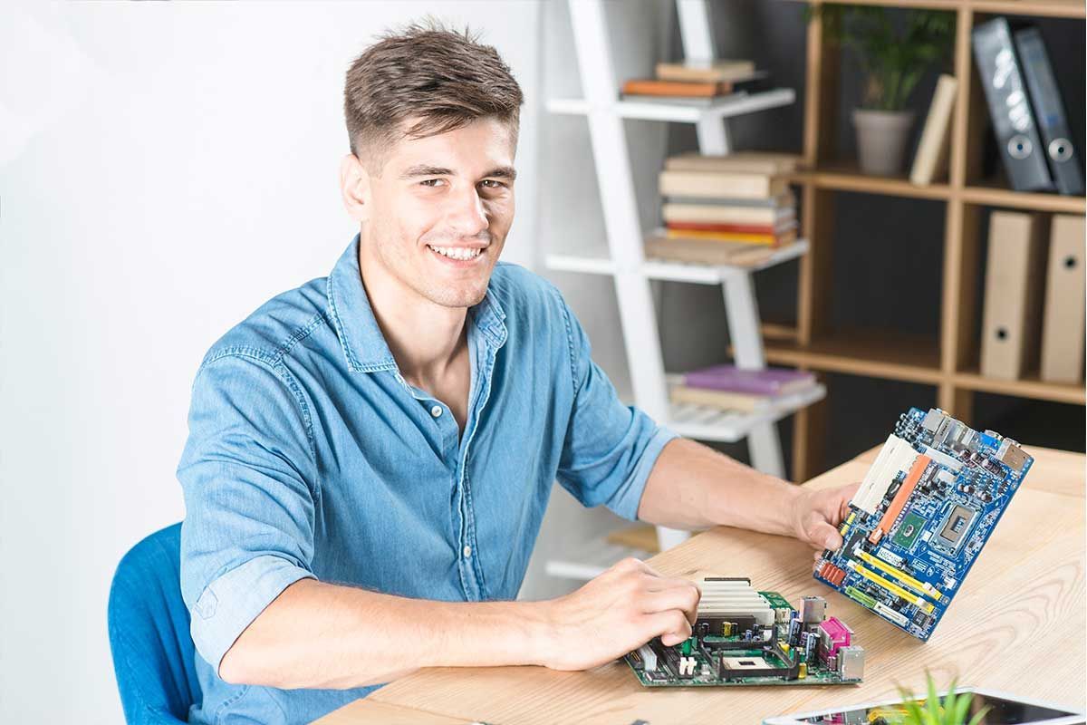 RCC Computers technician working on a computer